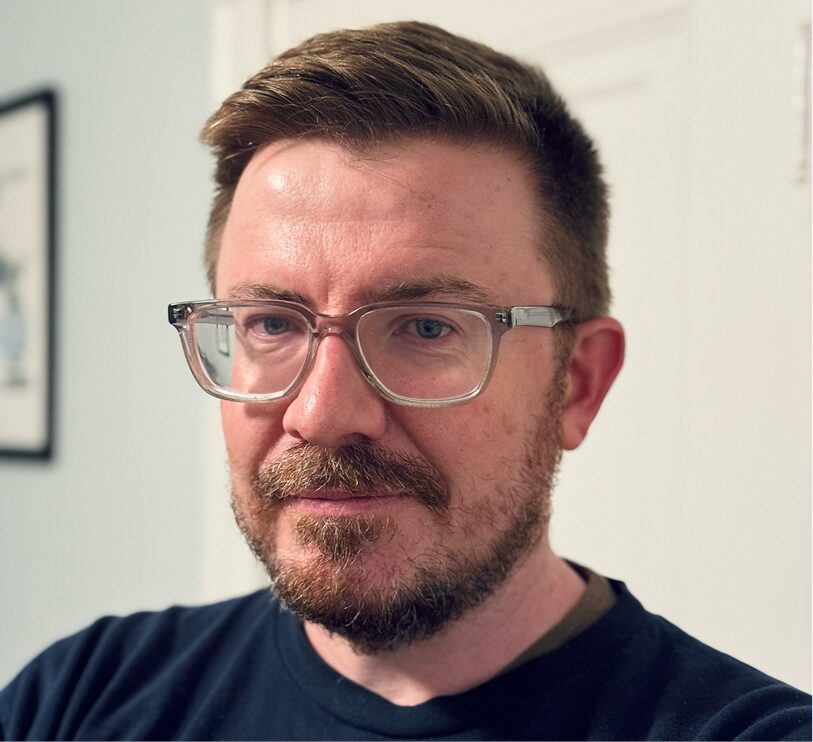 Headshot of Harvard math lecturer Aubrey Clayton.